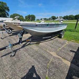 lot 39 image: 1991 Smokercraft 15 with Newer Trailer, 40HP Electric Start Johnson, Deep Sidewalls, Solid Floors
