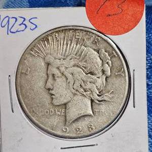 lot 43 image: 1923-S Peace $ (in card)