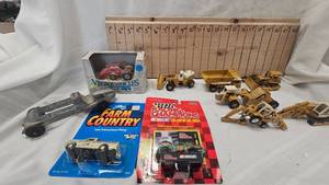 lot 9 image: Ertl IH Die Cast Construction 110 Scale, Ford 8N Model in box, Racing ChampionsFarm Country Die Cast