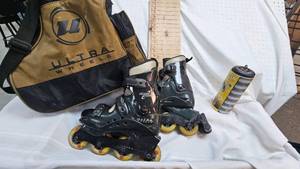 lot 142 image: Pair of Mens Rollerblades in carrying case with extra wheels, great condition, see pics for size