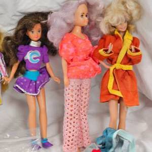lot 96 image: Barbie Doll Lot with Accessories and Clothes