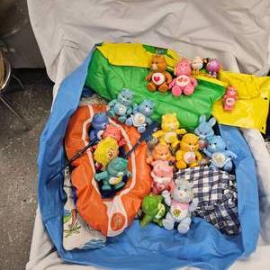 lot 111 image: Care Bear Figurine Lot and BarbieDoll Inflatable FurnitureRafts
