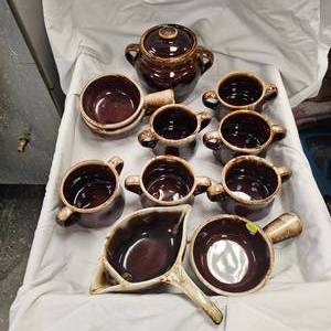 lot 112 image: McCoy Brown Drip Pattern Pottery Mugs, Soup Bowls, and Gray Boat