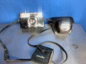 lot 42 image: Minolta Hi-Matic 7s Camera with Original Case, Strap, and Flash