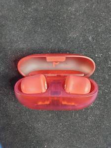 lot 23 image: Beats by Dr. Dre Beats Studio Buds Wireless Noise-Cancelling Earbuds - Transparent Red