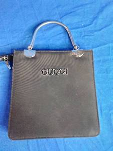 lot 86 image: Gucci Handbag