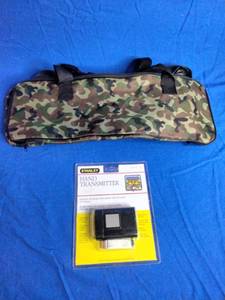 lot 88 image: Garage Door Remote and Gun Bag