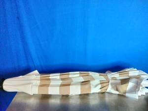 lot 101 image: Sun-Ray 9 Round Steel 8-Rib Solar-Lighted Patio Umbrella