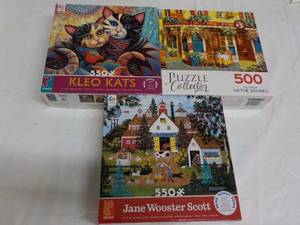 lot 14 image: 3 Puzzles...
