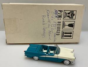 lot 21 image: Vintage Miniature Road Champ Die Cast 1955 Starfire Oldsmobile Convertible (NIB)