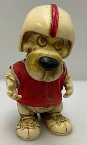 lot 115 image: Vintage RARE 1977 Creative Mfg. Inc Football Player Dog Promo Bank (Crack In Neck Needs Repair)
