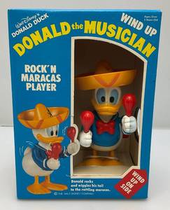 lot 144 image: Vintage Illco USA Walt Disney Donald The Musician Wind Uo DONALD DUCK (NIB)