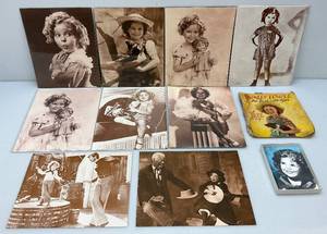 lot 181 image: Misc. Vintage Shirley Temple 11 x 14 Photos (Sealed In Plastic) And Shirley Temple Items