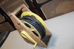 lot 9 image: Heavy Duty Extension Cord on Wooden Reel