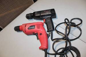 lot 12 image: Set of 2 Electric Drills - Black and Red ToolShop Drills