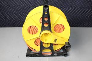 lot 28 image: Heavy-Duty Extension Cord Reel with 100-Foot Cable