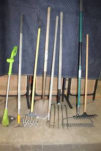 lot 35 image: Set of 10 Garden Tools Including Rakes, Shovels, and More