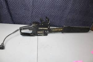 lot 40 image: Used Craftsman Electric Chainsaw with 14-inch Bar