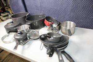 lot 55 image: Assorted Cookware Set with Pots, Pans, and Lids