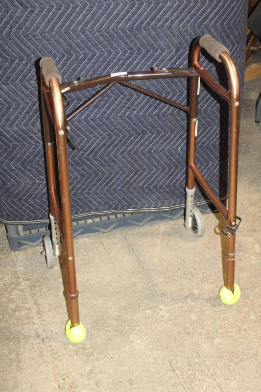 lot 222 image: Adjustable Folding Walker with Tennis Ball Glides