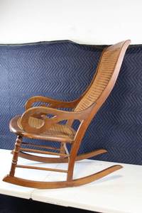 lot 5 image: Antique Wooden Rocking Chair with Cane Seat and Back