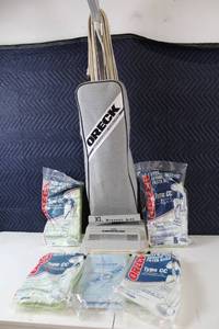 lot 12 image: Used Oreck XL Upright Vacuum Cleaner with 4 Type CC Bags