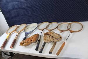lot 22 image: Vintage Collection of 3 Tennis Rackets, 4 badminton rackets, and 2 Ball Hawk Baseball Gloves