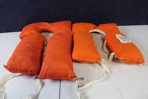 lot 40 image: Pair Adult Orange Life Jackets