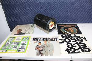 lot 45 image: Collection of Bill Cosby Vinyl Records with Stand