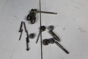lot 54 image: Assorted Metalworking Tap and Die Set with T-Handle Tap Wrench