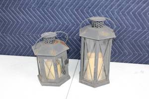 lot 59 image: Set of 2 Rustic Metal Lanterns with Candles
