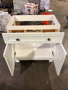 lot 48 image: Glacier Bay Everdean 31 in. Single Sink White Bath Vanity NO Top (Assembled)   Customer Returns See Pictures