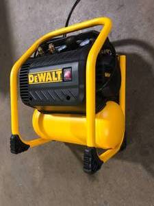 lot 14 image: DEWALT 2.5 Gal. Portable Electric Heavy Duty 200 PSI Quiet Air Compressor     Customer Returns See Pictures