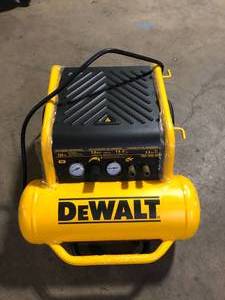 lot 15 image: DEWALT 4.5 Gal. Portable Electric Air Compressor   Customer Returns See Pictures