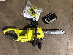 lot 18 image: RYOBI 40V HP Brushless 14 in. Battery Chainsaw with 4.0 Ah Battery and Charger  Used  Customer Returns See Pictures