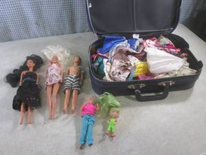 lot 27 image: (A-3) Assorted Dolls and Case Full ...