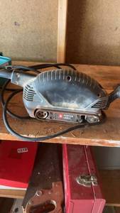 lot 1523 image: Porter Cable Belt Sander with Makita Carrying Case