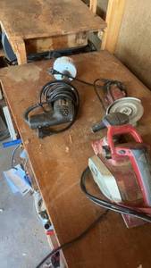 lot 1550 image: Set of Power Tools Including Drill, Angle Grinder, and Belt Sander