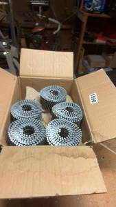lot 1590 image: Box of Bostitch Coil Nails for Nail Gun