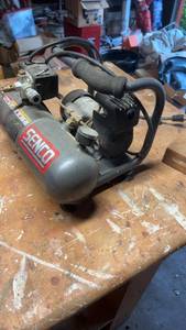 lot 1591 image: Used Senco Air Compressor with Hose