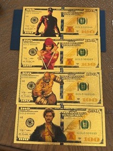 lot 2 image: 24K Gold Marvel Character $100 Dollar Bills