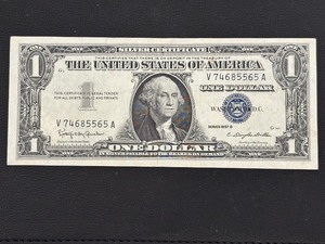 lot 4 image: 1957 B Blue Seal $1 Dollar Silver Certificate Uncirculated
