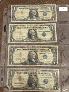lot 35 image: 1957 Blue Seal $1 Dollar Silver Certificates
