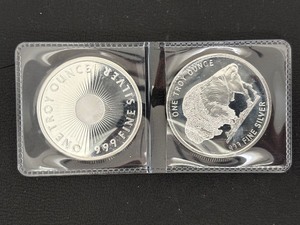 lot 42 image: 2 - 1 Ounce .999 Fine Silver Rounds