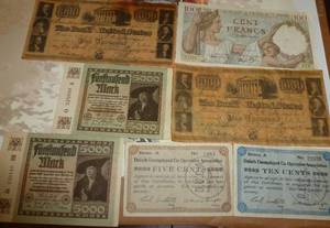lot 10 image: Francs, Marks, US notes and 1933 Duluth unemployment notes for 5 and 10 cents