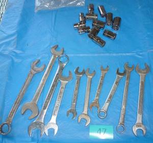 lot 47 image: Group of misc wrenches and a new set of craftsman metric 12 in sockets