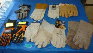 lot 58 image: NINE pair of mens gloves most are XL (3 are used)
