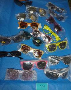lot 59 image: 18 pair of new sunglasses mostly adult