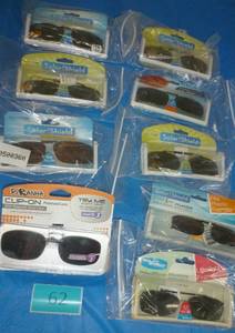 lot 62 image: 9 pair of clip on sunglasses various size