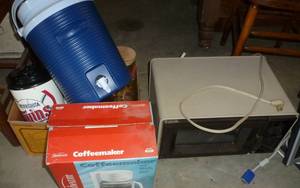 lot 102 image: Small Litton microwave, used coffee maker, water jug, twins mug